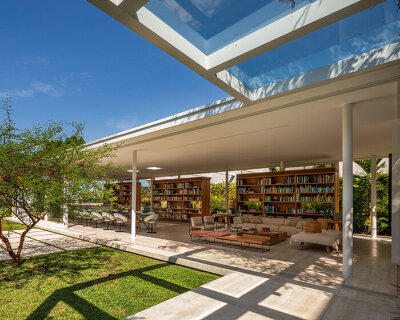 siqueira + azul arquitetura curates a breezy, light-filled 'book house' in brazil