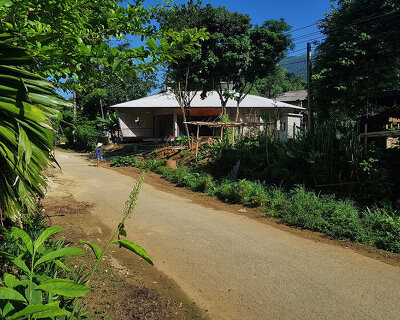 corrugated metal roof tops modern rural house in a remote region of vietnam