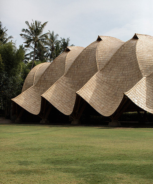 draping roof tops intricate bamboo structure by IBUKU for green school in bali, indonesia
