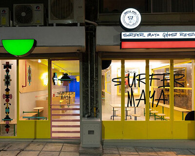graffiti fonts + neon signs characterize studiomateriality's 'surfer maya' restaurant in greece