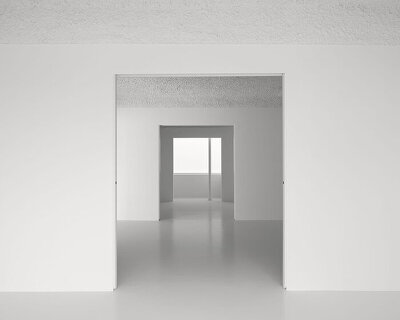 HANGHAR negates architecture in bare, abstract house responding to social standards