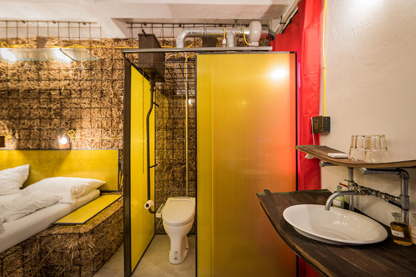 heri&salli convert old brewery in vienna into guesthouse made of straw