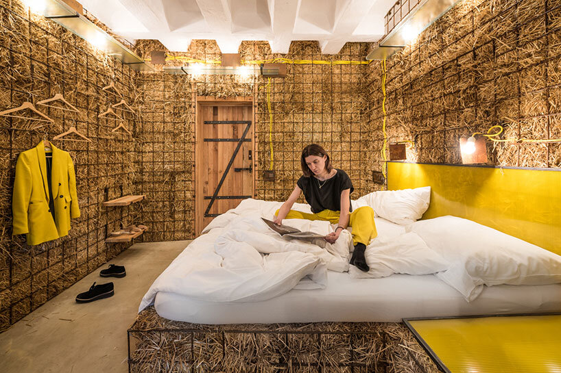 heri&salli convert old brewery in vienna into guesthouse made of straw