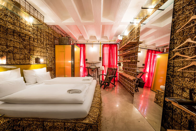 heri&salli convert old brewery in vienna into guesthouse made of straw