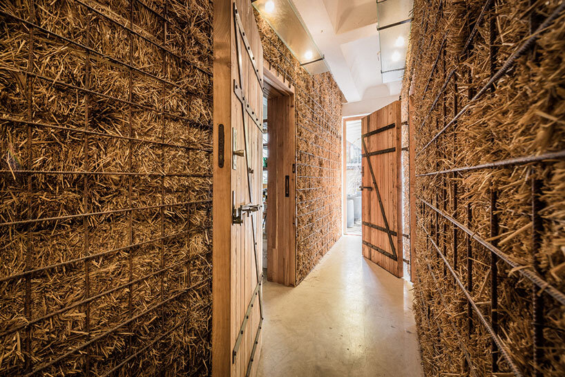 heri&salli convert old brewery in vienna into guesthouse made of straw