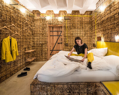 heri&salli convert old brewery in vienna into guesthouse made of straw