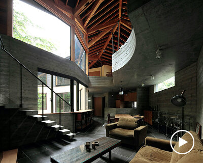 irregular-angled 'phase dance' residence by takeshi hirobe wraps around a large tree in japan