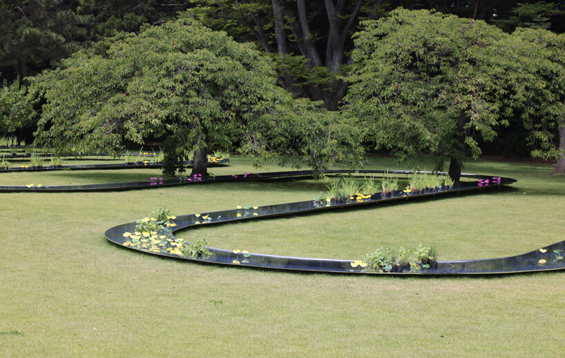 kazuyo sejima's curved water pavilion flows through tokyo's hama-rikyu gardens