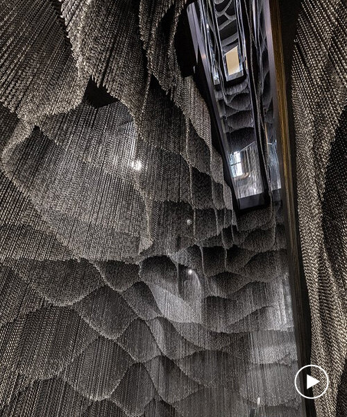 kengo kuma installs shimmering chain-clad staircase inside gaudí's casa batlló