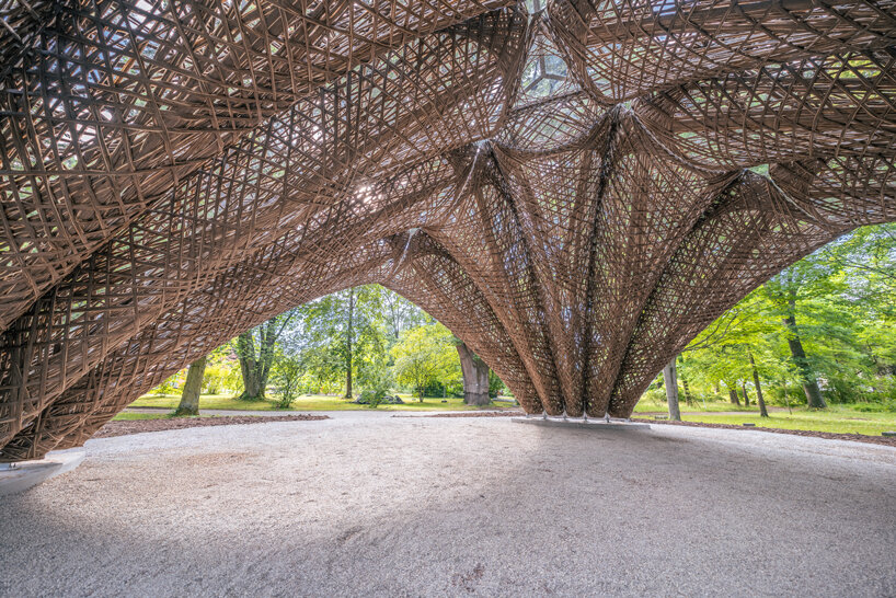 robotically wound flax fiber builds the 'livMatS pavilion' in freiburg designboom