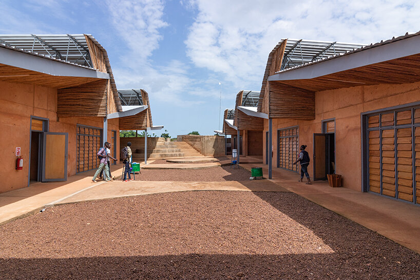 local clay + transparent timber skin assemble kéré architecture's university in west africa