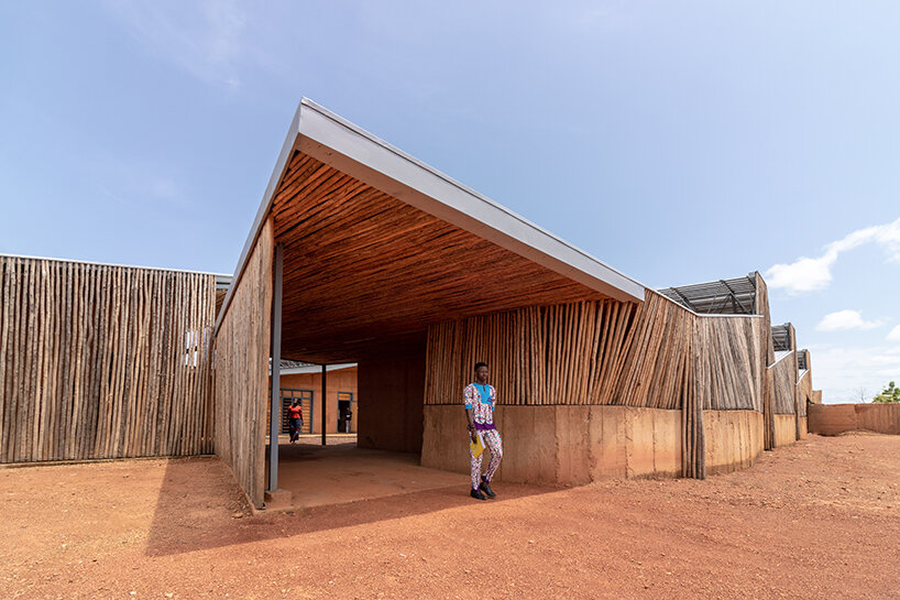 local clay + transparent timber skin assemble kéré architecture's university in west africa