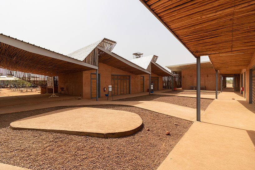 local clay + transparent timber skin assemble kéré architecture's university in west africa