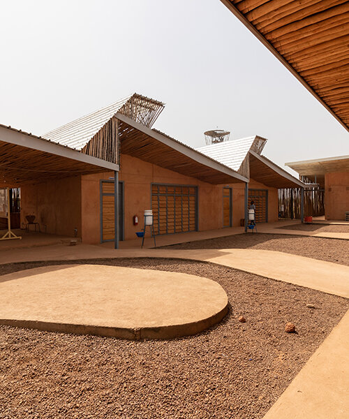 local clay + transparent timber skin assemble kéré architecture's university in west africa