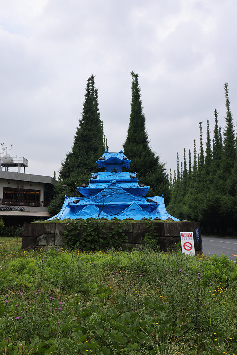 cardboard + blue tarp castles by makoto aida emphasize temporariness in tokyo