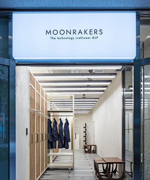 movable display racks allow multiple configurations in this apparel showroom in tokyo