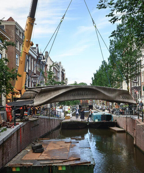 world's first 3D printed steel bridge installed over one of amsterdam's oldest canals