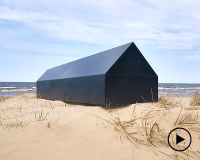 NRJA designs a coffin for architects and guess what, it's black and shaped like a house