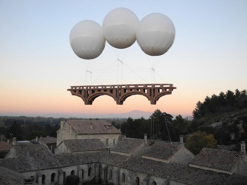 floating bridges and other temporary cardboard structures by artist olivier grossetête