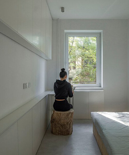 post-war family dormitory is transformed into a tiny white-toned cozy apartment in beijing
