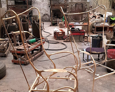 ranchuan is an art-nouveau-inspired armchair formed by a single continuous curved line