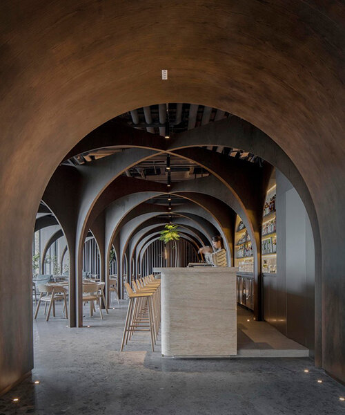 a matrix of cross arches stimulates curiosity within MARS studio's restaurant in china