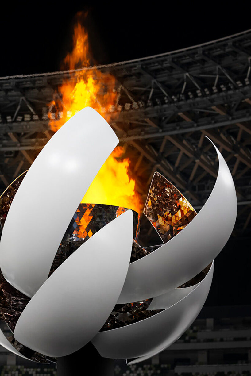sun-like form by nendo blooms the ceremonial cauldron of fire in tokyo olympics