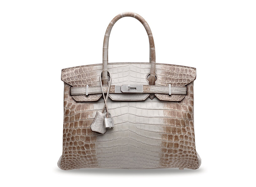 Jane Birkin designed namesake luxury bag on an airplane sick bag