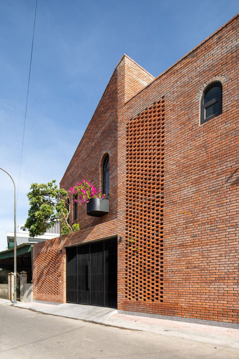 dom architect studio incorporates nature into brick-clad house in vietnam