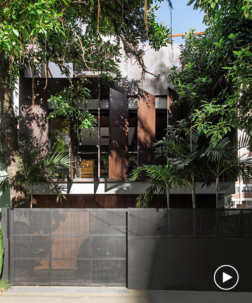 vertical screens clad pimont arquitetura's house in brazil to achieve privacy + permeability