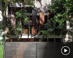 vertical screens clad pimont arquitetura's house in brazil to achieve privacy + permeability
