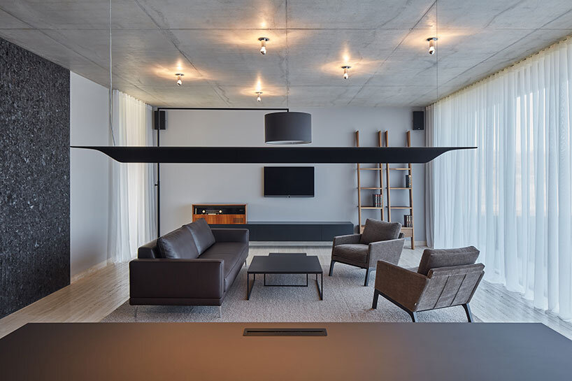 ADR architects' kostelec house takes shape as two stretching concrete slabs