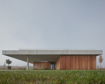 ADR architects' kostelec house takes shape as two stretching concrete slabs