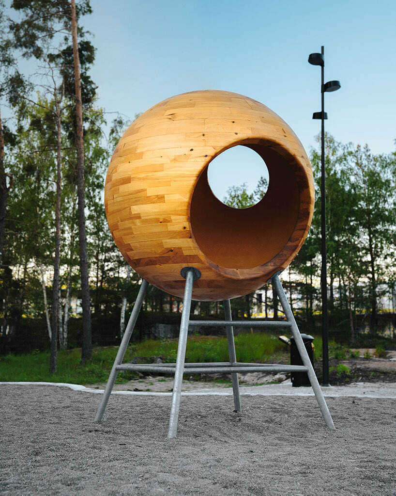 a stockholm park is dotted with these colorful playground spheres by andrénfogelström