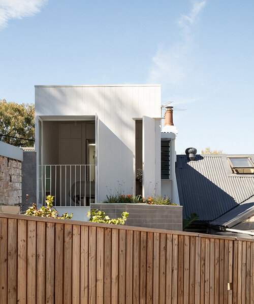 micro home nestled among busy surroundings in sydney is lightweight and simple in form