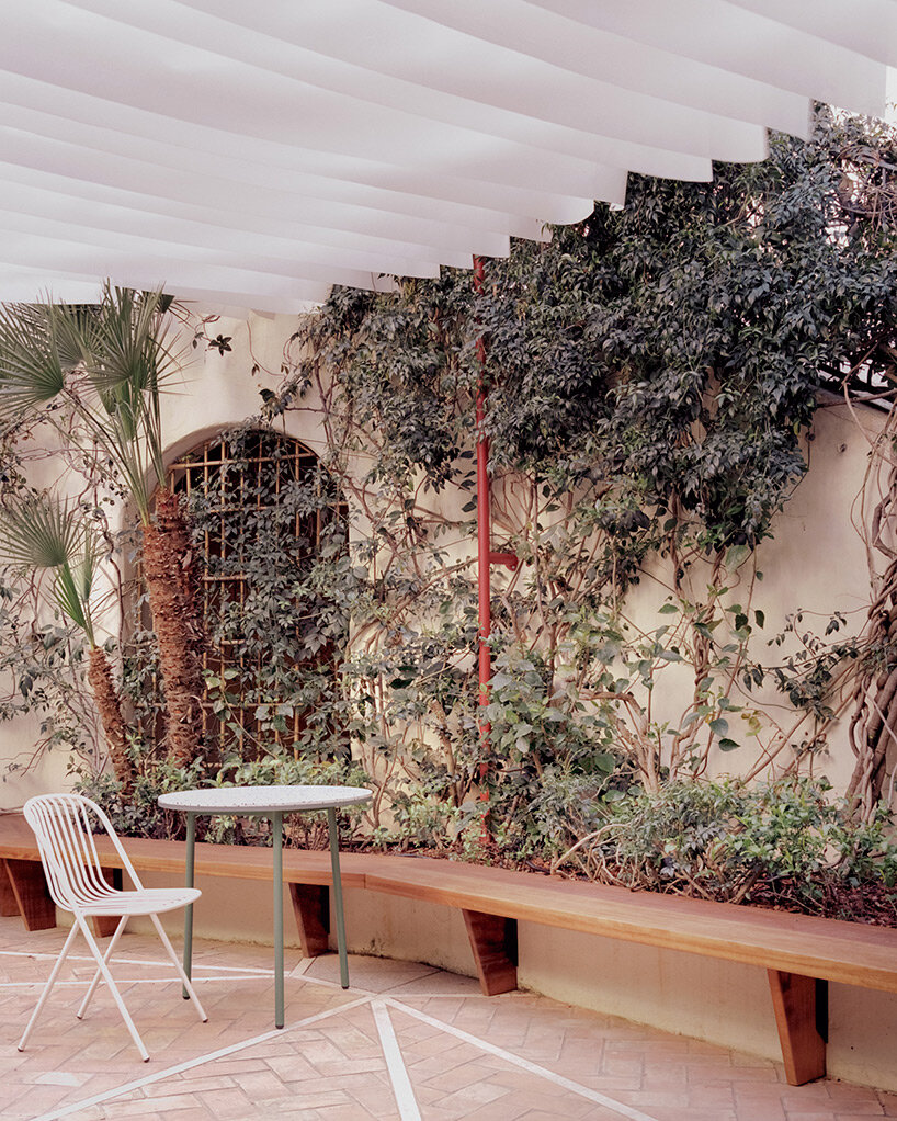 empty spaces + earthy tones give shape to 'myrto' restaurant in porto cervo, italy