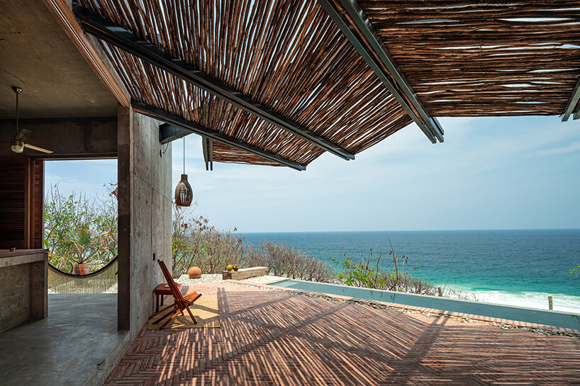 two rotated concrete volumes look for sunrise and sunset in mexican 'casa del sapo'