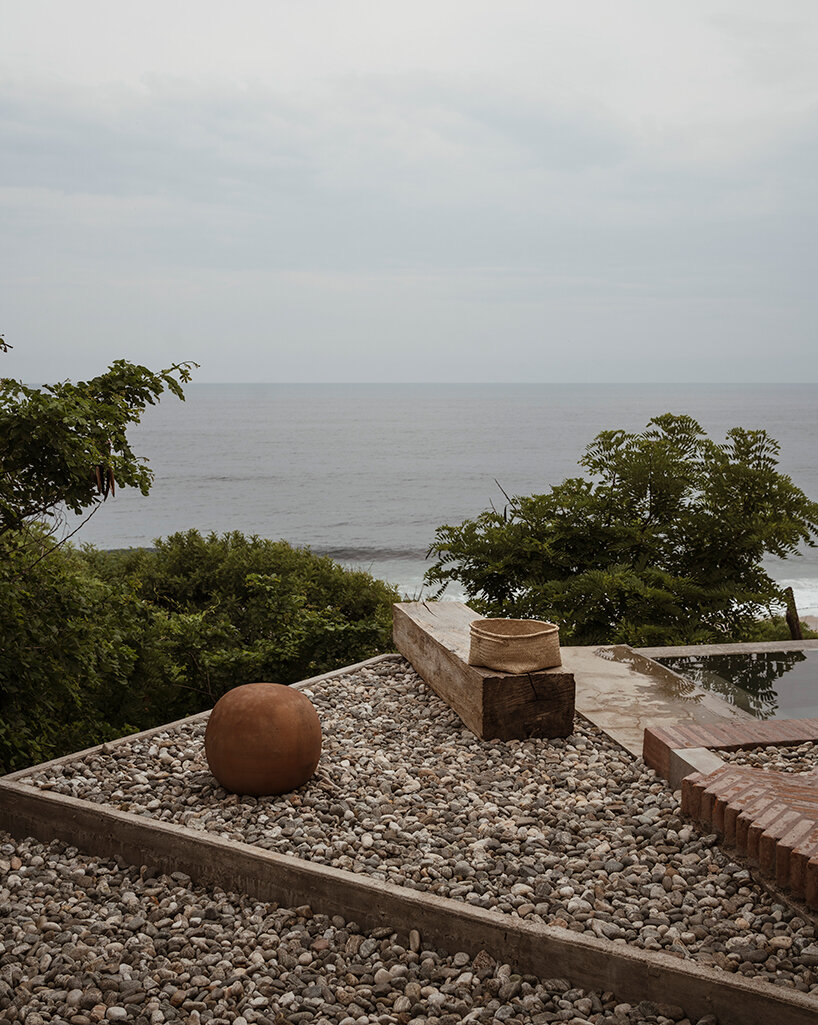 two rotated concrete volumes look for sunrise and sunset at mexican 'casa del sapo'