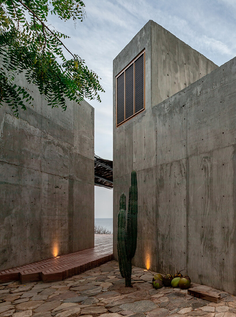 two rotated concrete volumes look for sunrise and sunset at mexican 'casa del sapo'