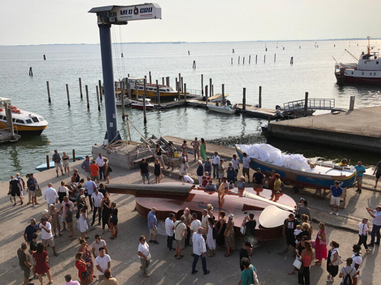 giant violin floats down venice's grand canal complete with string quartet
