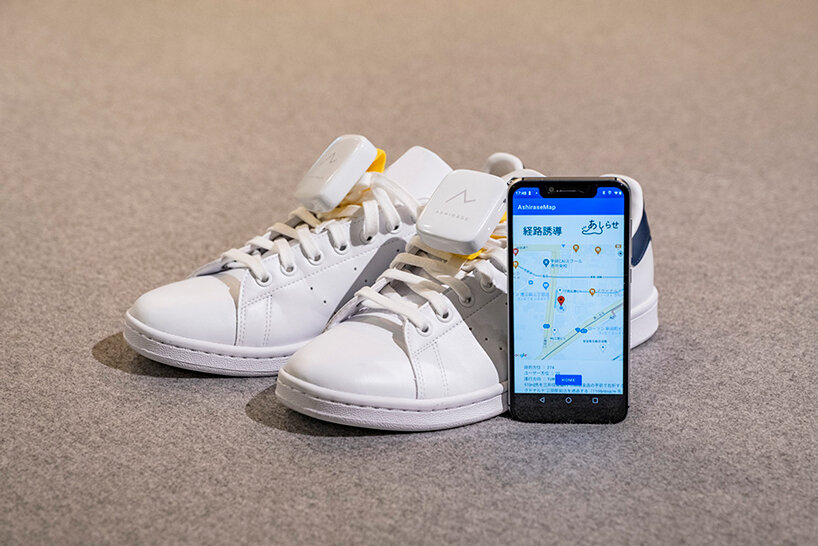 honda unveils ‘ashirase’, a navigation system in shoes to help the visually impaired while walking