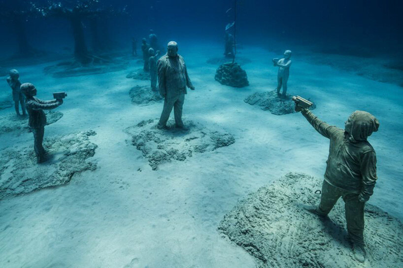 jason decaires taylor submerges intricate sculptural forest in the waters of ayia napa, cyprus