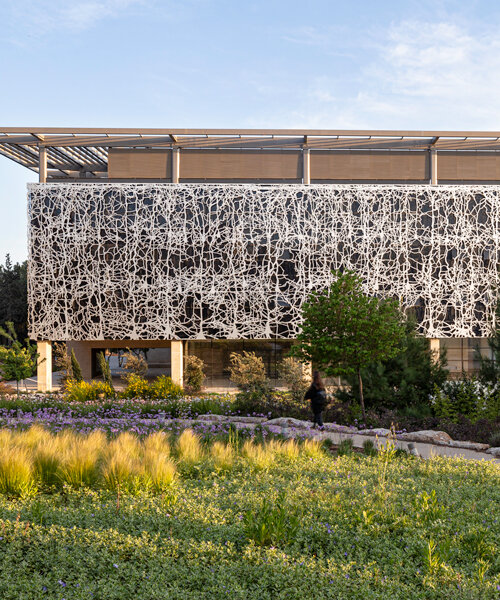 foster + partners' center for brain sciences is wrapped in a neurological-inspired facade