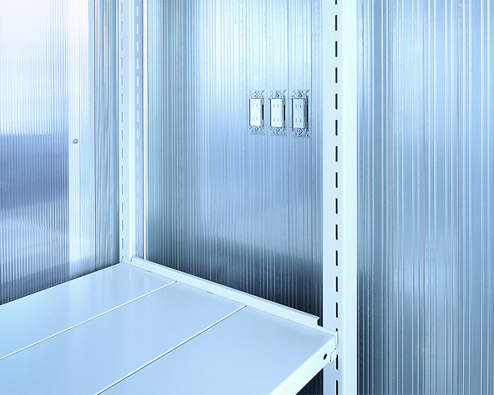 polycarbonate sheet partitions + custom electrical outlets decorate office interior in tokyo