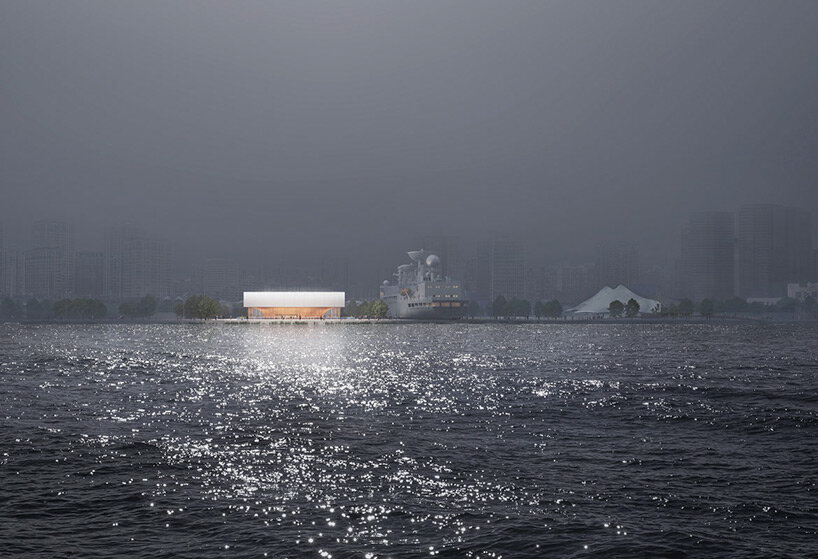 the 'submarine museum' by PES-architects emerges as a mirror-clad bridge over the huangpu river in shanghai