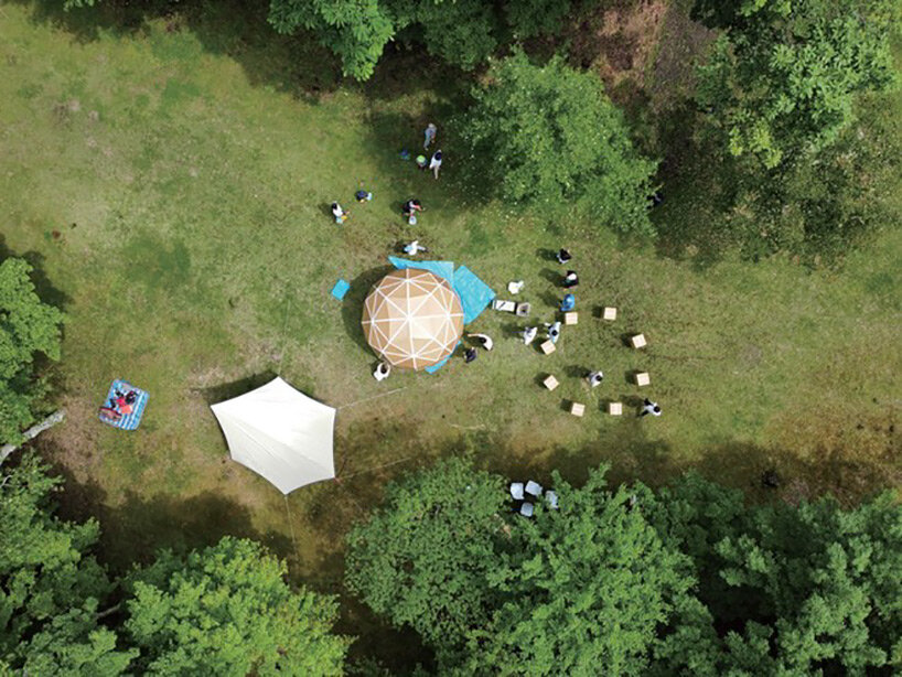 prefab cardboard 'dan dan dome' tents provide lightweight, durable + waterproof shelter
