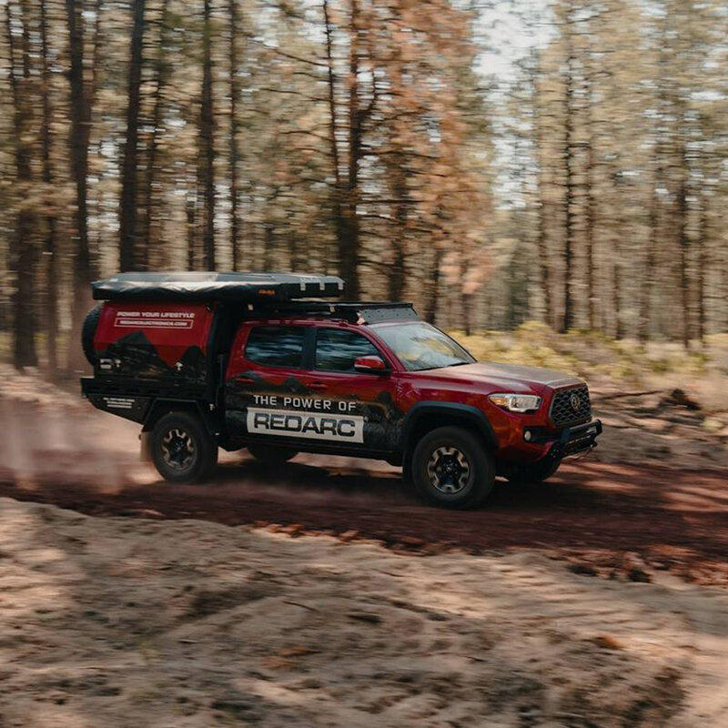 redarc customizes toyota tacoma into one tough overlander camper truck