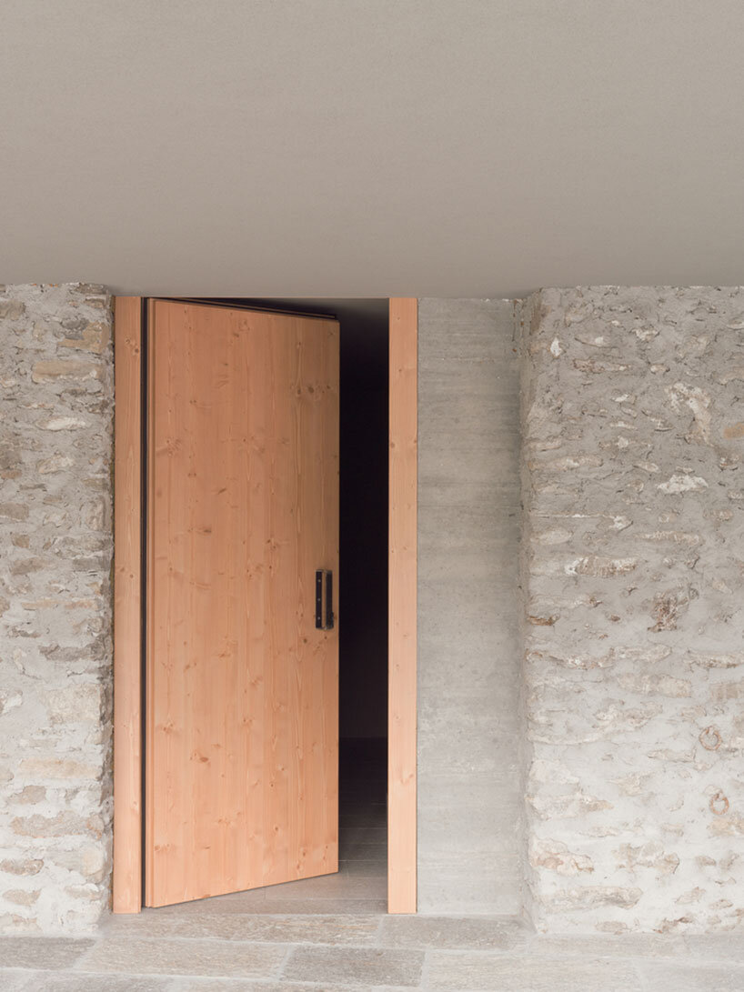 rinaldo del nero preserves historic 'built to last' house with timber intervention