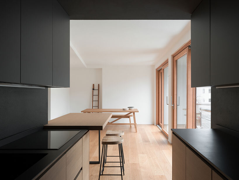 rinaldo del nero preserves historic 'built to last' house with timber intervention