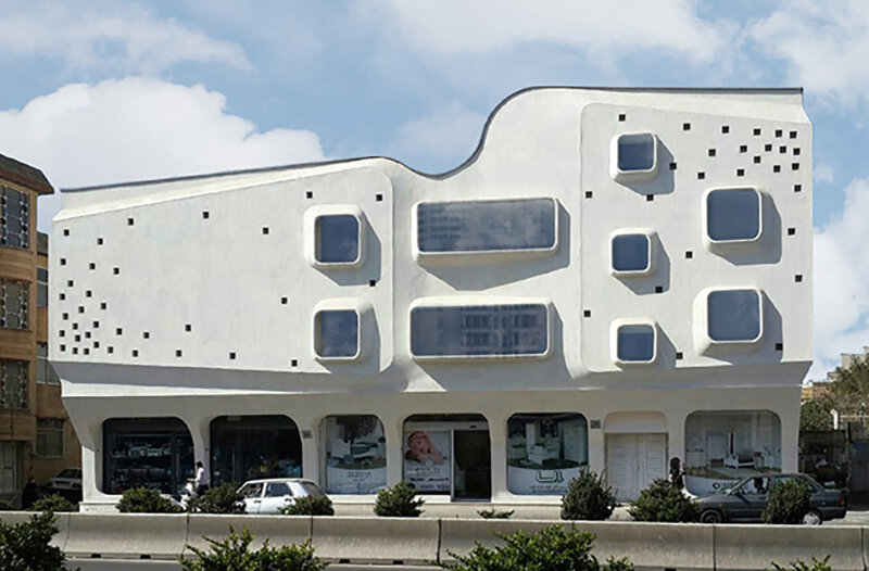 curved angles, extruded windows and square dots characterize futuristic building in iran